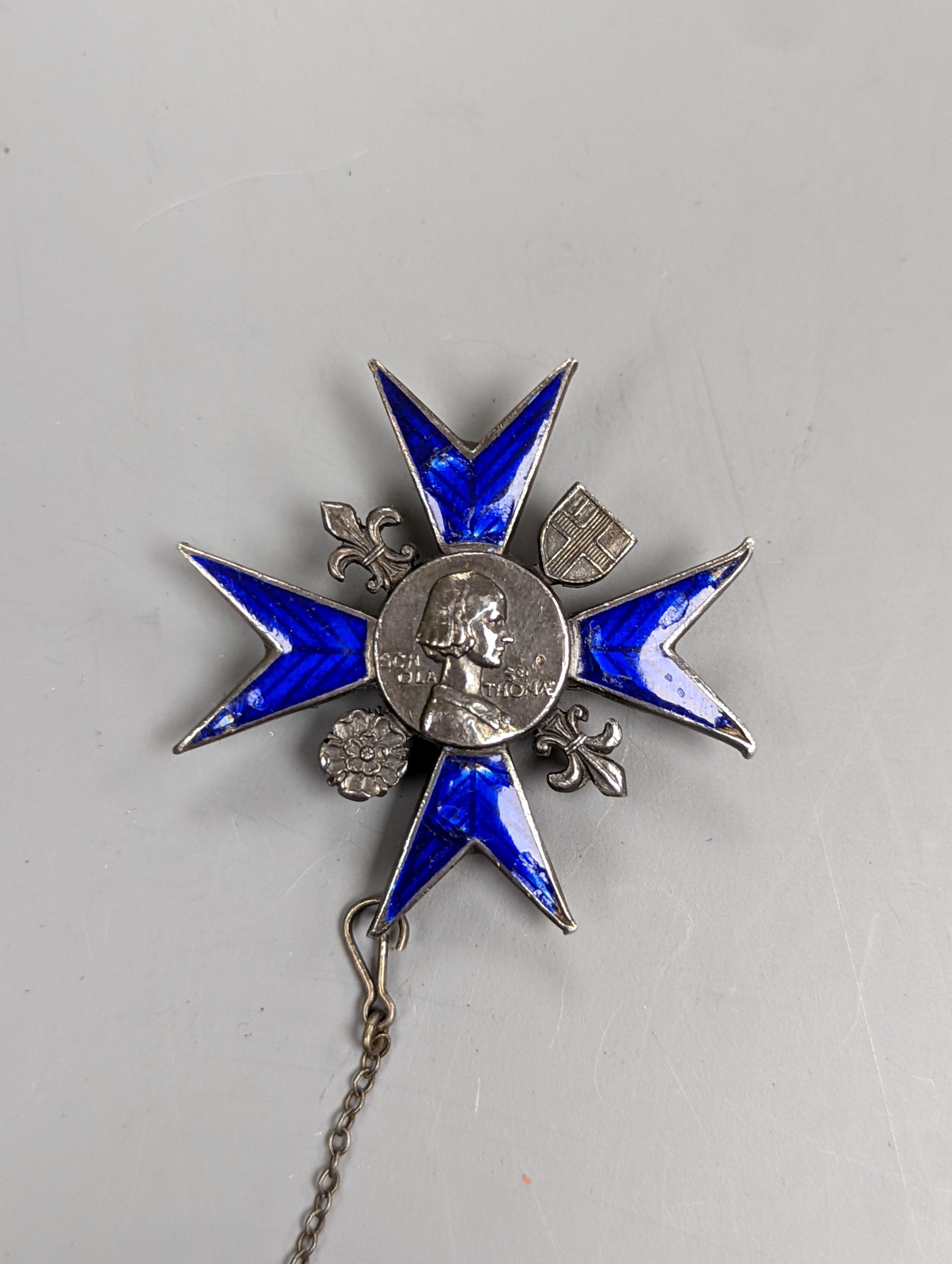 An enamelled Nightingale School, St. Thomas Hospital Loyalty badge, 1954, 37mm.